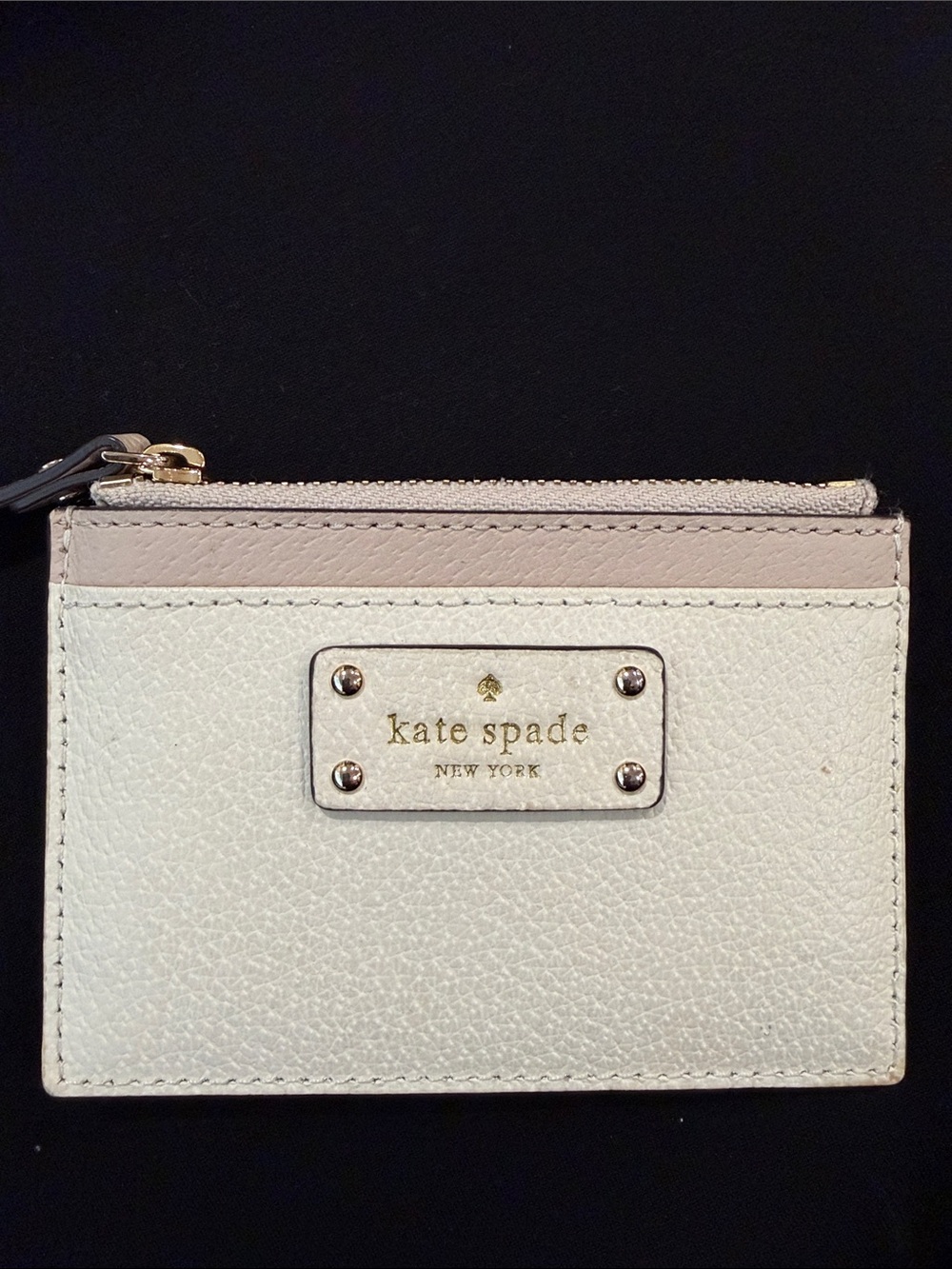 kate spade cream and blush leather card holder with gold logo plaque